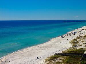 This spacious condominium features 4 bedrooms, 3 full baths, one of the largest balconies on all of Panama City Beach, and a deeded parking spot under your condo! This is a gorgeous corner unit with a spectacular balcony and comes fully furnished and rental ready! Some features include gulf front master bedroom, tile floors throughout, new balcony and living room furniture and more. Ocean Reef Condominium Resort has wonderful amenities including a gulf-front heated pool, indoor heated pool, gulf front hot tub, steam room, sauna, workout room. as well as grilling area, and pet area. You also have a fabulous location, centrally located and close to restaurants, including Runaway Island for gulf front dining, shops, including all that Pier Park has to offer!