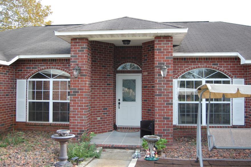 This 3 bedroom 2 bathroom home has been UPDATED with new flooring, beautiful kitchen and bathroom cabinets and new stainless steel kitchen appliances. This BEAUTIFUL ''MUST SEE'' home is move in ready!!! Nice quiet neighborhood near golf course with deeded water access. Fenced in back yard and screened in back porch perfect for sitting. Price has been lowered $13K since home hit the market. Vacant on Supra.