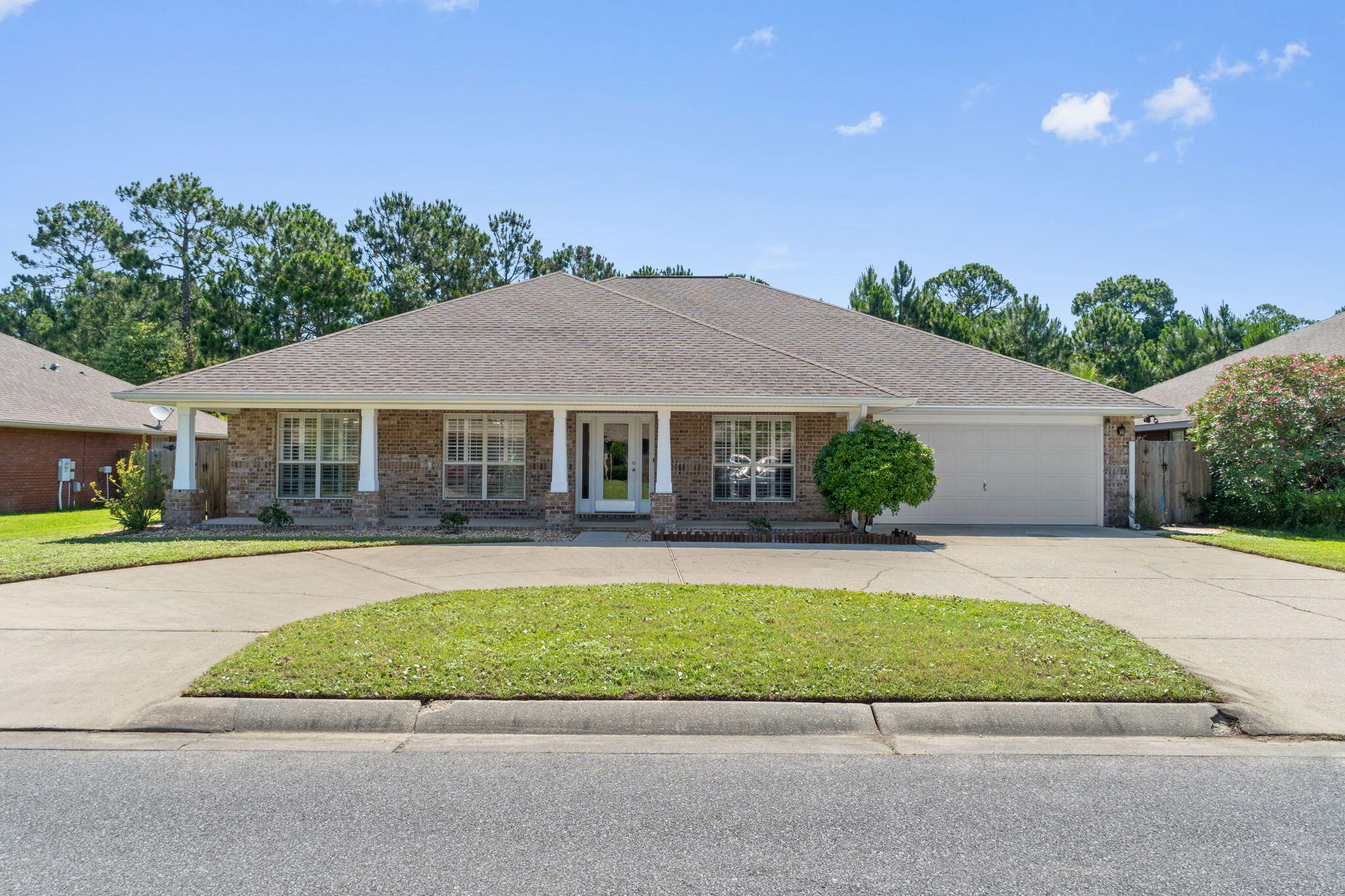 WOW! This All Brick home boast over 3100sf and offers 4 bedrooms, 3 full baths, a huge living and dining space and separate office/playroom!! It features Tile floors in every room, Plantation Shutters throughout, Hurricane protection, Circular Driveway providing plenty of parking, Gutters and large fenced back yard.  The chef in the family will love the spacious kitchen and walk in pantry area. This home is a great space for entertaining as well and when you're not indoors, you can enjoy the screen enclosed patio overlooking the spacious back yard and wooded area for additional privacy.  If you have dreamed of living in Florida and having a Pool, you have plenty of space to add the pool of your dreams!  Contact your agent today to take a private tour!!!