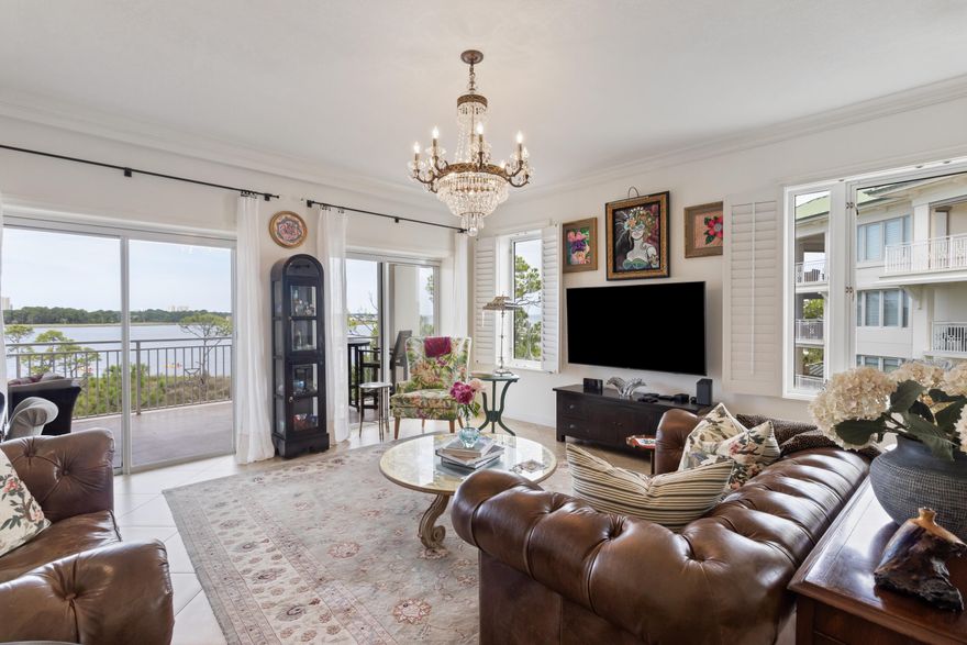 Nestled beside the Sandestin Marina and just outside the gates of Baytowne Wharf, this rare 4th-floor condominium in The Ketch offers unmatched bayfront living in a secure, low-density community of only three units per floor. Behind the private gate, you'll find beautifully maintained grounds, ample parking, golf cart spaces, and the option to purchase a garage in the future. Residents enjoy a sparkling community pool, walking paths, and an impressive building entrance leading to a secure lobby and elevator access. Inside, the smart split-bedroom layout features a long hallway opening to a spacious kitchen, living room, and master suiteall with panoramic bay views. The kitchen boasts abundant cabinetry, granite countertops, and stainless steel appliances, while the living room and master suite each open to the oversized main balconyperfect for sunset views and Sandestin's regular fireworks. The master bath includes a walk-in shower and jetted tub. Two private guest suites, each with their own balcony and full bath, are located on the opposite side of the unit. Additional highlights include all-tile flooring, a new water heater, Culligan water treatment system, stacking washer/dryer, and ample storage.

Anchorage is a non-short-term rental community, ensuring peace and privacy for full-time residents and second-home owners. Sandestin offers world-class amenities4 golf courses, tennis courts, pools, shopping, dining, and beach accessall reachable by golf cart in minutes. Boat slips are available for purchase just outside the Anchorage gates at the Marina Bar & Grill. An identical updated unit across the hall with a garage recently sold for $1.55M, giving you the opportunity to customize this one to your style.