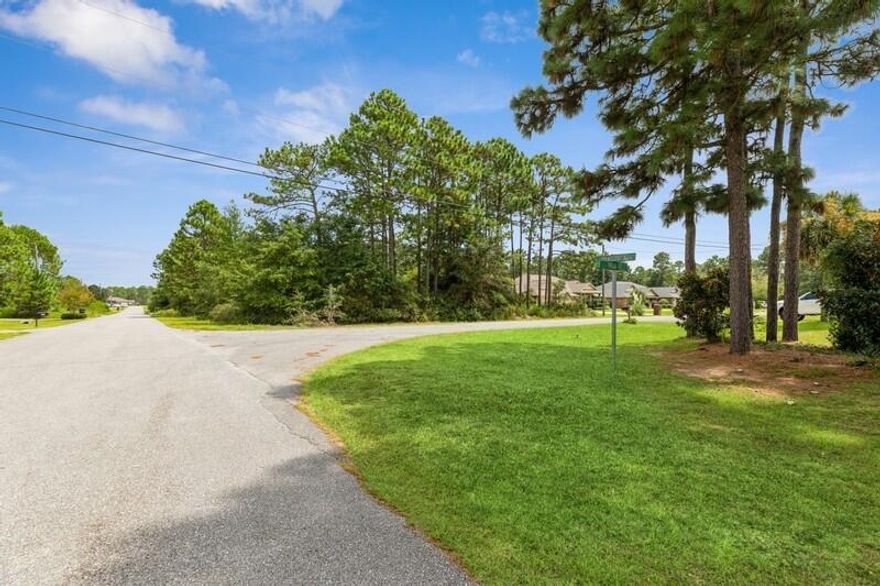 COME BUILD YOUR DREAM HOME ON THIS GORGEOUS CORNER LOT. SMALL STREAM RUNS ON REAR OF PROPERTY. COME AND EJOY THE AMENITIES OF HOLLEY BY THE SEA COMMUNITY CENTER, INCLUDES PICNIC AREA, FISHING PIER, TWO POOLS, GAME AND EXERCISE ROOM.