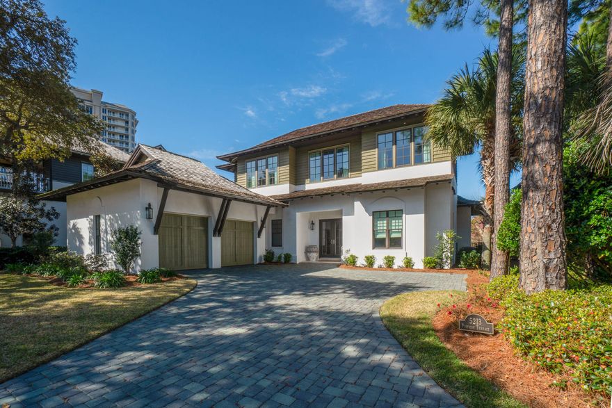 *** Price Reduction ***Lakeside living in one of the area's closest proximities to the Gulf. Behind double gates, situated within Island Estates, this beautiful single family residence is sure to please. Featuring a unique West Indies style architecture with the finest design trends and high end finishes. Enjoy this lovely home year around as it features a heated swimming pool, hot tub, outdoor kitchen, and fenced backyard. The private Master Suite is conveniently located on the main level as well as an additional guest bedroom with full en suite bath. The upstairs features two guest bedrooms both with full en suite baths, and a separate comfortable living space. The kitchen offers top of the line appliances and the layout makes entertaining simple and eas