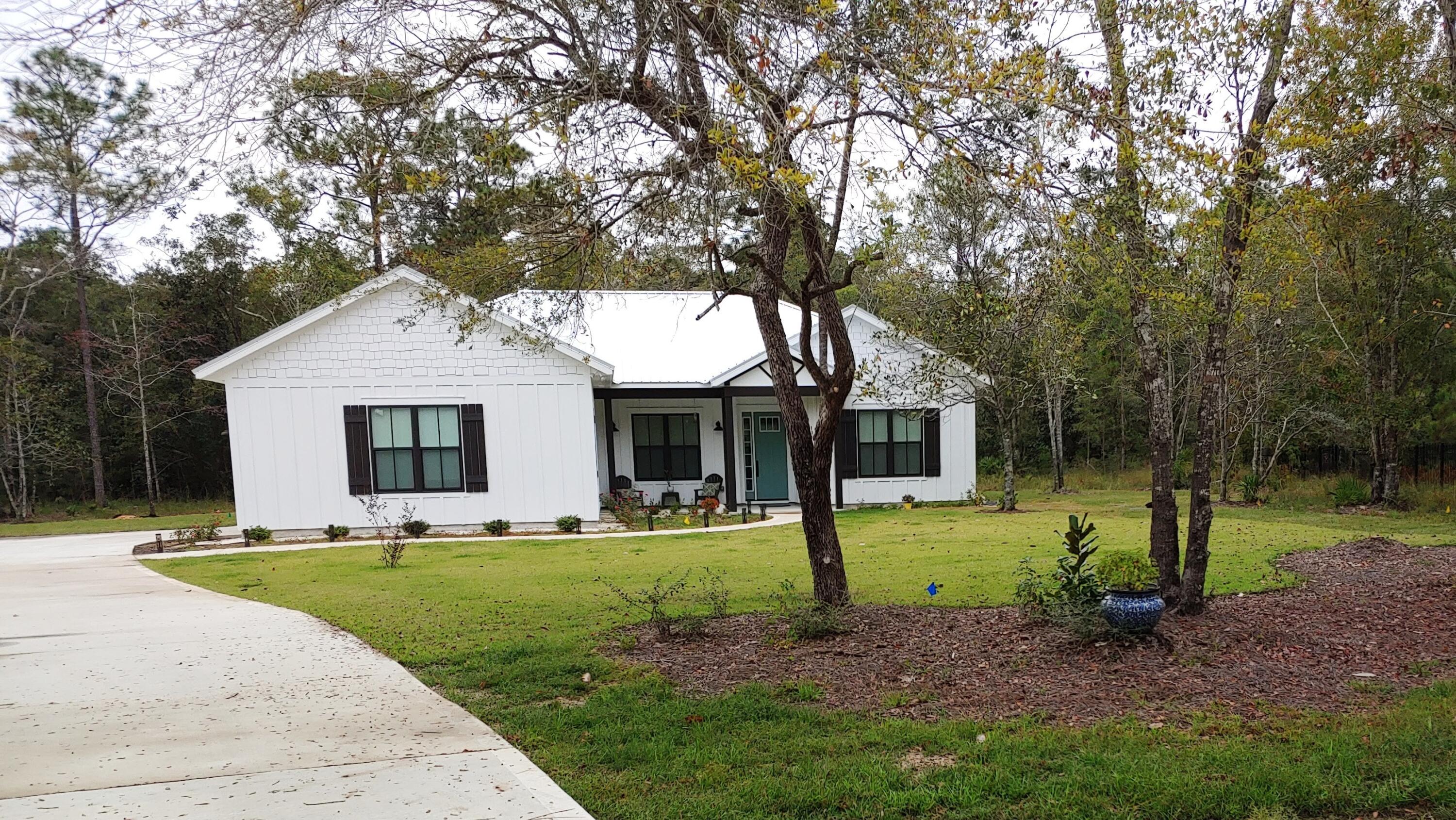 Beautiful custom built home, less than five months old. Open-concept encompassing the feel of true great room, dining room, living room and kitchen all in one space, perfect for entertaining. Quartzite counters in kitchen, walk-in custom pantry. 8 foot door ways and 10 foot ceilings throughout the come. Screened enclosed back patio. Amenities to include tennis courts, gated storage facility, boardwalk and fishing dock, and landscaping in common areas.