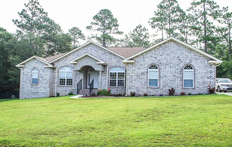 AVAILABLE... September 12, 2022. 3bed/2bth home PLUS a Formal Dining Room & Flex space! This meticulously maintained home in a country atmosphere is the one for you. With over an acre of land, at the end of a cul-de-sac, in an area that is heavily wooded to the rear and sides, sits a contemporary gem with all of the architectural bells and whistles. Inside you are greeted in the Living Room with wood burning fireplace and a double trey ceiling. The large Kitchen features granite counters, black electric appliances, and gorgeous custom wood cabinetry. The Master Suite is fit for a king (or queen), and the yard and deck...you just HAVE to see it! NO smoking. Pet friendly with a non-refundable pet fee. Lawn care included.