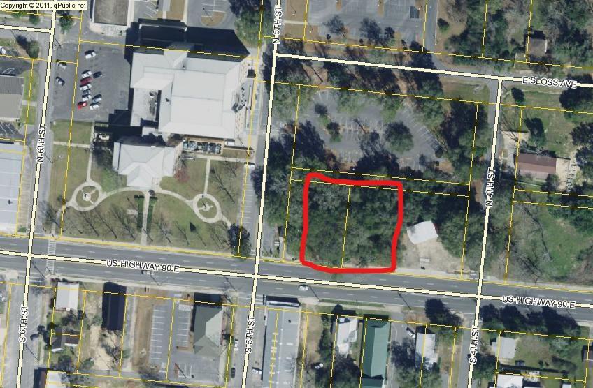 Highway 90 frontage within very close proximity of Walton County Courthouse. It is on north side of Highway 90, same as courthouse. C1 already. Abuts courthouse park lot.