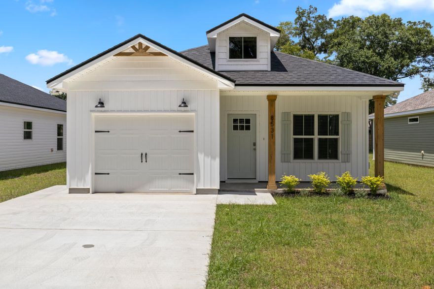 This stunning, semi-custom Craftsman-inspired home offers the perfect blend of thoughtful design, modern finishes, and spacious living. With 3 bedrooms, 2 bathrooms, and an oversized private lot, this home is designed to impress at every turn. Step inside to soaring 9-ft ceilings and an open-concept layout that seamlessly connects the kitchen, dining, and family room--perfect for everyday living and entertaining alike. The gourmet kitchen is a true showstopper, featuring quartz countertops, tall cabinets with crown molding, stainless steel appliances, and a free-standing gas range. A tankless hot water heater ensures endless comfort and efficiency. The owner's retreat is a private haven with oversized walk-in closets and a spa-inspired bath offering dual vanities and elegant finishes. Additional highlights include a covered back porch, ideal for relaxing or hosting, and an expansive yard that provides both privacy and potential. Every detail of this home reflects quality beyond standard builder grade, making it a rare find in today's market. Conveniently located close to interstates, hospitals, and the university, and nestled in the vibrant, growing Ensley area, this home combines modern comfort with unbeatable convenience. Don't miss the chance to make this gem yoursschedule a tour today and fall in love!