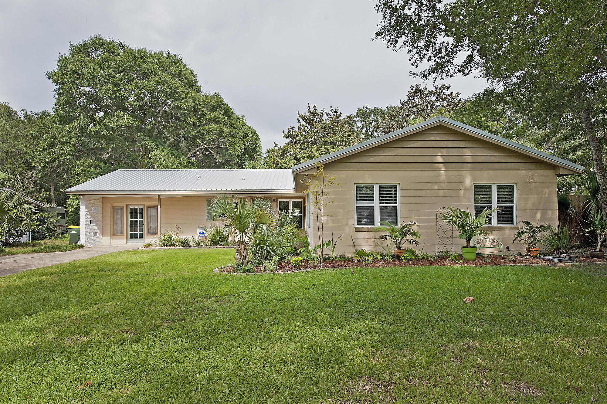 Space, space, and more space! This home boast over 2500+ of sq ft. of remodeled perfection! A few of the important extras first! he roof is a 2017 metal roof! Practically brand new! The home is equipped with a tankless hot water system. Do you have a RV OR HOT TUB and need a 30 amp plug? Do you like to be outside? This home has a covered porch, good size yard with new sod, and an outdoor shower. This home has it all! This home has a beautiful remodeled kitchen with subway tile and granite. The master suite is one of a kind! The bedroom is oversized and flows to a large bathroom with two shower heads in the ALL TILE walk in shower that flows to a GIANT 12x12 Walk in closet/changing room! Through the rest of the home you have another master bedroom with private bathroom.