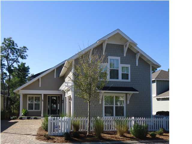 Beautiful 4 bedroom, 4.5 bath home located in the wonderful community of WaterSound West Beach. Great floor plan that boasts a kitchen open to the great room, spacious dining room, first floor master suite, 2 bedrooms and 2 baths on second floor with loft (study or office), balcony, & large storage/bonus room, carriage house over garage, and large screened patio with gas grill. Both the screened patio and the upstairs balcony overlook the lake and wooden walkways to the beach. Features include: hardwood floors throughout, cottage V-groove trim/crown moulding, gas fireplace, coffered ceiling in master, custom cabinetry and granite counters throughout,spacious laundry room, and 2-car garage. Current owner has just installed designer window treatments, custom closets in master, and