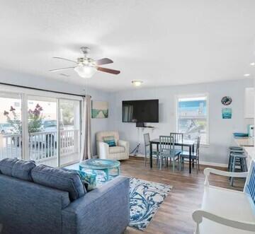 LOOK NO FURTHER!! This newly renovated 2 bedroom condo corner unit is the CLOSEST unit to Deeded Beach Access. Enjoy the warm gulf breezes and sugar white sand with private gate access. The kitchen boasts gorgeous granite countertops, a custom backsplash, and new appliances. Brand-new washer/dryer! New windows throughout. Comfortably accommodating 6 guests with a king bed in the master, a bunk bed in the guest room, and a sleeper sofa in the living room. NO CARPET! NEW LVP flooring throughout. Fully furnished and the tasteful decor provides the ultimate relaxing beach experience .Soak in the sun at the large beautiful community pool, expansive decks, picnic area w/ BBQ grills. This unit provides proximity to Destin Harbor, Big Kahuna's water park, local restaurants, and shopping.