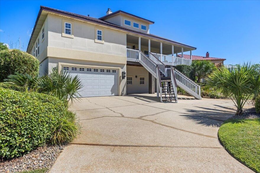 For those seeking a lifestyle of tranquility and luxury living, this stunning steel-framed home offers breathtaking water views at every turn from sunrise to sunset. You have deeded access to the inter-coastal, picnic area and a gazebo for entertaining guest year round. This residence epitomizes coastal living at its finest featuring high ceilings, plethora of exterior decks and windows for natural lightning. This residence offers an open floor plan with a large kitchen island with tons of cabinetry throughout the entire space. The master bedroom has its own private exterior deck, big glass shower, jet tubs and dual vanities. The home offers a basement area that is covered, massive garage for extra storage and huge covered patio area in the back of the home for your own private oasis.