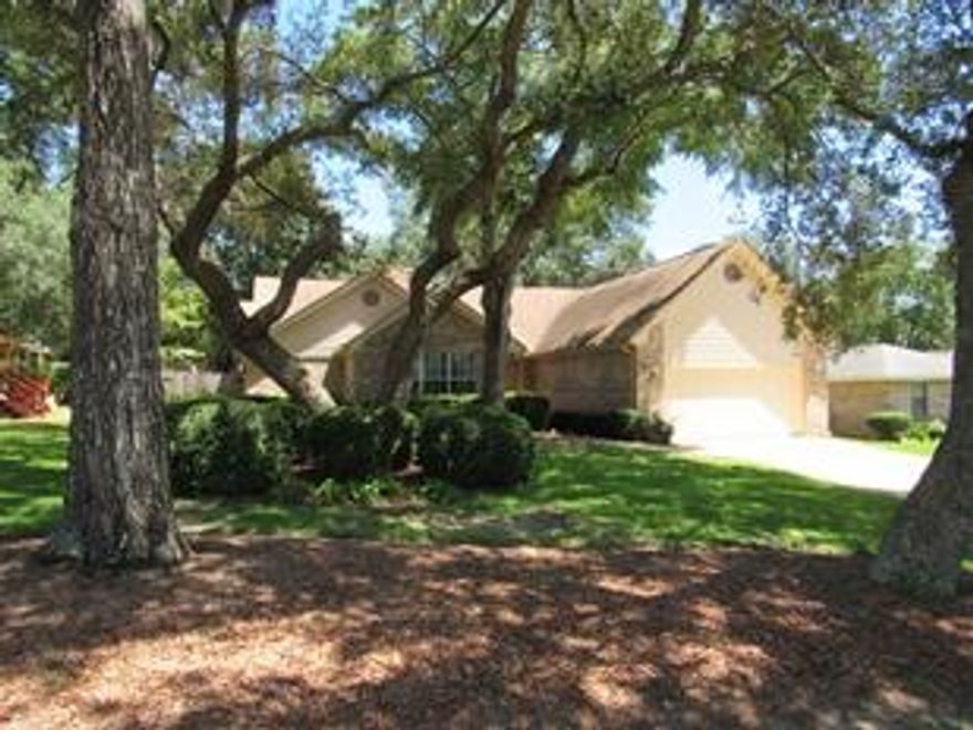 This beautiful 3 BR home in Bluewater Bay is close to shopping and highway access, but located on a quiet cul-de-sac with great neighbors in a well-cared-for community. Raised ceilings in dining room, great room, and master BR. Kitchen features a new faucet, breakfast nook, bar, full pantry, oak cabinets, cathedral ceiling, and all new stainless appliances. Nook overlooks the wooded back yard, which is completely fenced-in. Garage is a full 2-car garage with opener and remotes, and new attic stairs for additional storage. Laundry RM has full hook ups and new overhead wall cabinets. All lighting, window treatments, ceiling fans, and interior/exterior paint was replaced within the last year. Great room has a beautiful fireplace, the dining room can also be used as an office, playroom, or second living area. The floor plan offers a separate BA between the 2 additional bedrooms. The master BA is under a complete renovation with new cabinets, mirrors, granite countertops, sinks, walk-in shower, and separate garden tub. 2nd BA is also being renovated with a new cabinet, sink, and granite top. The master bedroom has a large walk-in closet, with separate men's closet. Local resort membership available offering swimming, tennis, golf, racket club, boating, and restaurants, all available within 5 minutes. First month's rent and one-month security deposit required at time of occupancy. Owner takes care of all maintenance except yard service. No smoking allowed on or in this property. No animals of any kind allowed on property.
