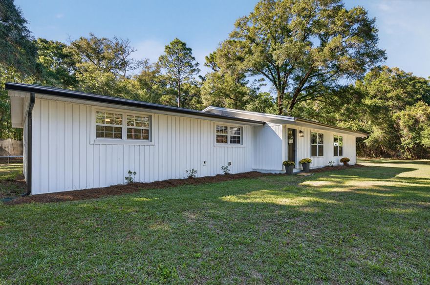 Escape to your own private retreat in the Baker/Holt area! This fully updated 3-bedroom, 2-bath home sits on 2.5 acres of peaceful country living. Inside, enjoy a modern open-concept layout with brand-new flooring, fixtures, kitchen, and bathrooms--completely move-in ready with an effective year of 2010. Outside, you'll find endless possibilities with a spacious pole barn, plenty of room for outdoor hobbies, and a chicken coop ready for your flock. Every detail has been refreshed from top to bottom, offering the perfect mix of comfort and acreage. If you've been dreaming of a home where modern living meets wide-open space, this one delivers it all. Call today for your private showing and make this Baker/Holt beauty yours!