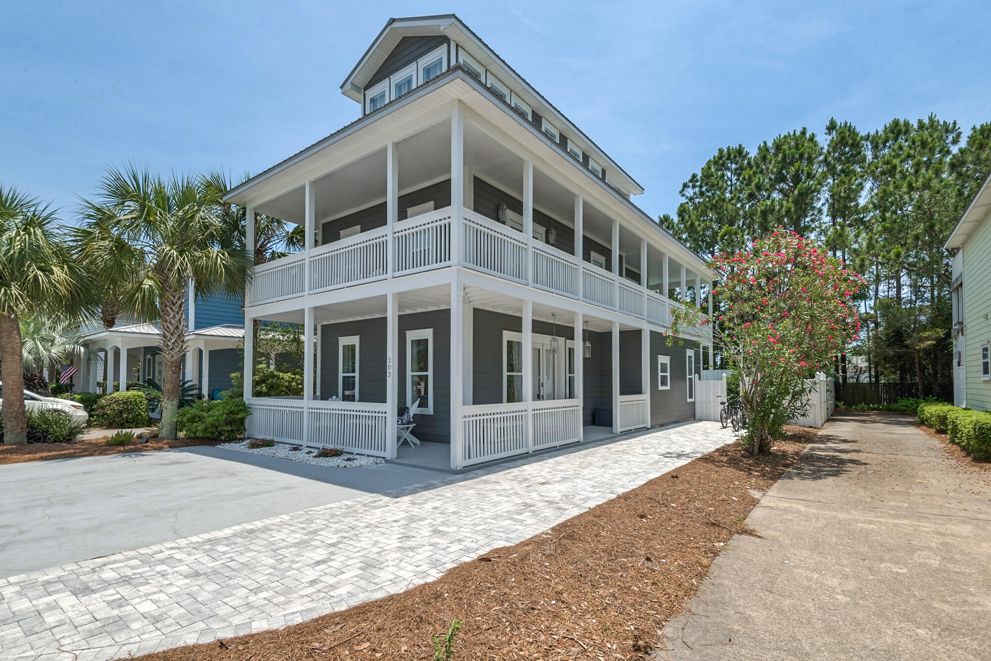 Professionally designed and fully renovated with all the luxuries and comforts of a private vacation home with your pool, ocean views, and easy beach access just steps away. Beautifully appointed with furniture and details that make your visits memorable within this quiet tucked away neighborhood in Seagrove Beach. Cottage style home with wraparound porches and a large private backyard with a heated pool is an Oasis for dining, grilling, and lounging. The home comes completely furnished. Rental projections are in mid to high $100K per year. The home is walking distance of eateries, shopping, and beach! Bike to Watercolor or Seaside to enjoy music and festivals or stay home and enjoy the comforts of this beautiful beach cottage! New beach park coming south of home!