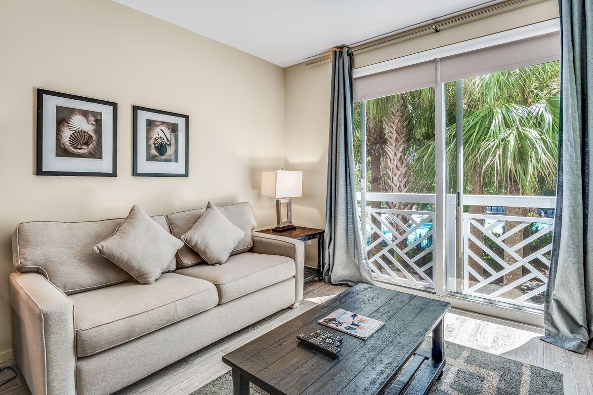 This appealing studio features upscale interiors and a desirable proximity to the vibrant Village of Baytowne Wharf at Sandestin. This proven vacation rental offers a king sized bed, sitting area, kitchenette with a microwave, sink, and mini refrigerator. Recent upgrades include new furnishing, wood plank tile flooring and a new HVAC. The unique location offers a stunning view of the resort pool. This vacation property is offered fully furnished and rental ready. Sandestin is Florida's elite resort, providing a variety of amenities including four championship golf courses, a world-class tennis center, 98 slip marina and sugar white beaches.