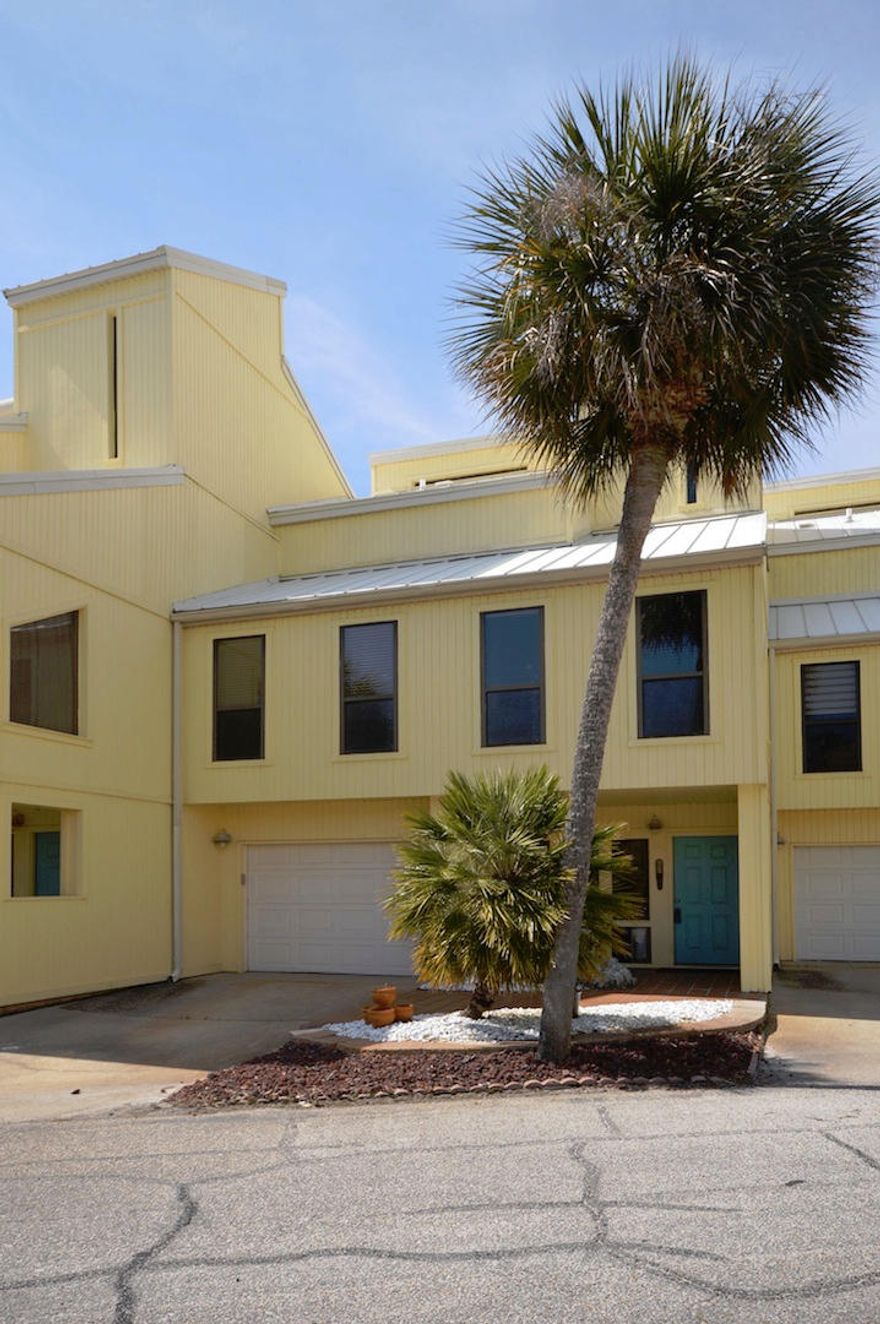 2043 sq. ft. 4 bedroom, 2 bath townhome in the Buena Vida Waterfront community with Sound Side Pool and Dock with Boat Slips. This well maintained community of 40 townhomes with garages, decks, split levels, and water views. Home has first level bedroom, storage and large patio. 2nd floor: living room and dining open to a large deck with water view, galley kitchen, bathroom, 2 bedrooms. 3rd floor: family room/bonus room, master bedroom with balcony, large walk-in closet, bathroom with steam shower, tub, and lots of storage.4th floor: spiral staircase with loft for an extra bonus room. The HOA fees cover weekly lawn care, weekly trash haul, pool maintenance and large dock with water and electric. Great pool overlooking the Intercoastal Waterway and its' amazing sunsets.