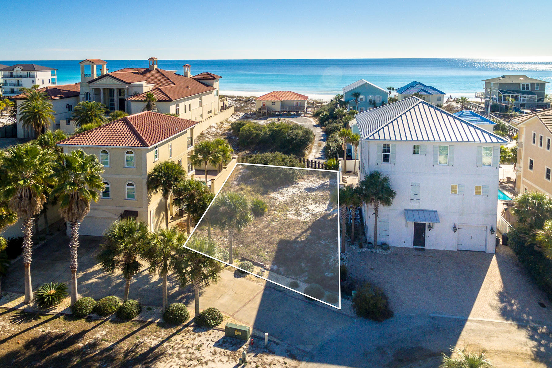 SEE THE BEACH AND HEAR THE SURF! THIS RARE HOME SITE IS SECOND TIER, JUST NORTH OF THE GULF FRONT PARCEL AND IS LOCATED IN FLOOD ZONE X. CLOSE TO BEACH WALKOVER AND NO HOA FEES! GREAT OPPORTUNITY FOR FULL/PART TIME LIVING OR RENTAL INVESTMENT. LAID BACK LOCATION YET NEAR GREAT SHOPPING AND DINING AT SILVER SANDS AND GRAND BOULEVARD.