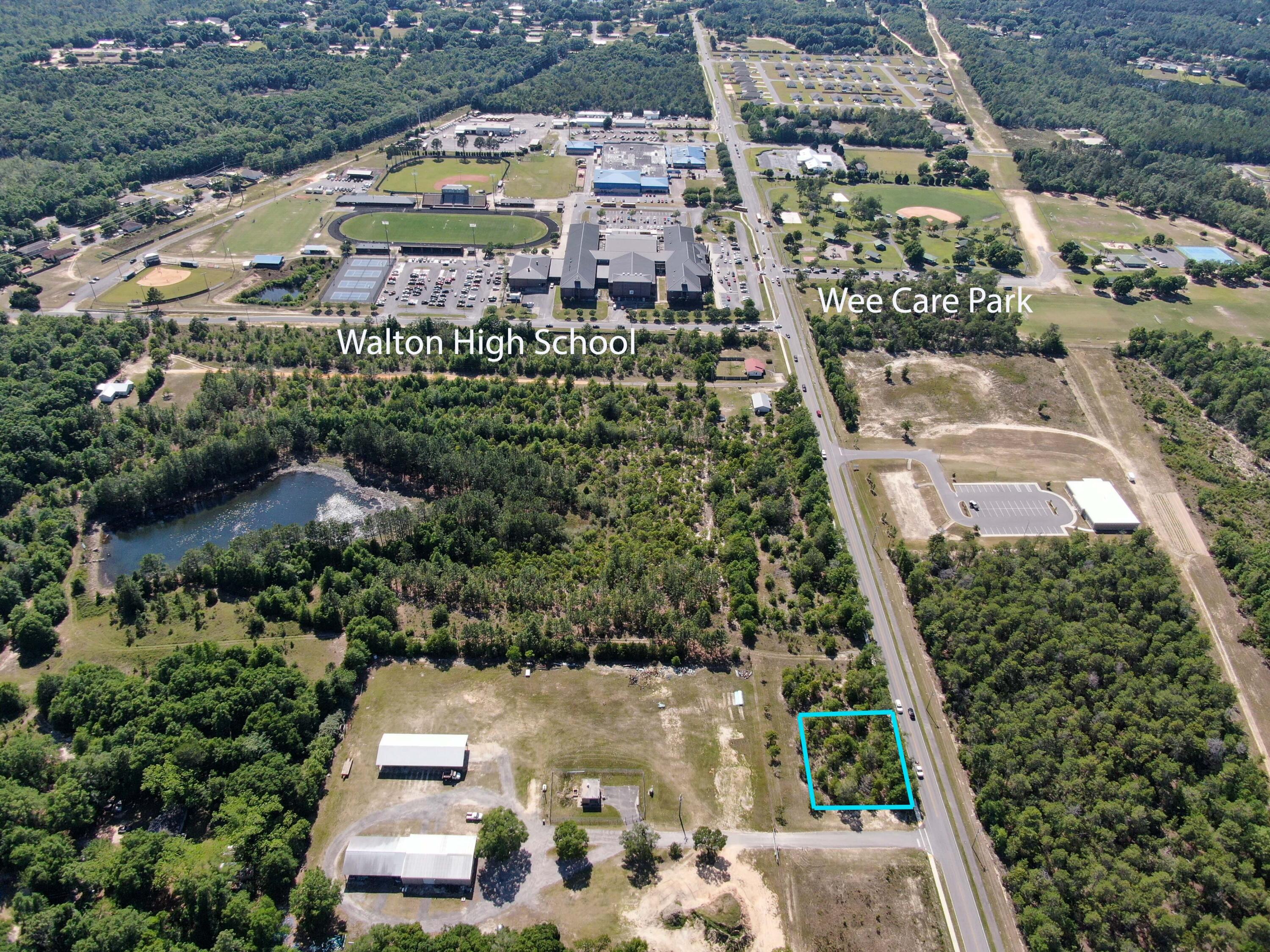 Perfectly level, lightly wooded lot within walking distance to schools, parks, and less than 5 minutes to downtown DeFuniak Springs. Per City Planning, lot may be split into two lots just by filing the plat (no approval needed). No utilities at this time with electricity, city water and sewer available. All information believed to be accurate however buyer should verify anything of importance such as lot splitting, zoning, etc.