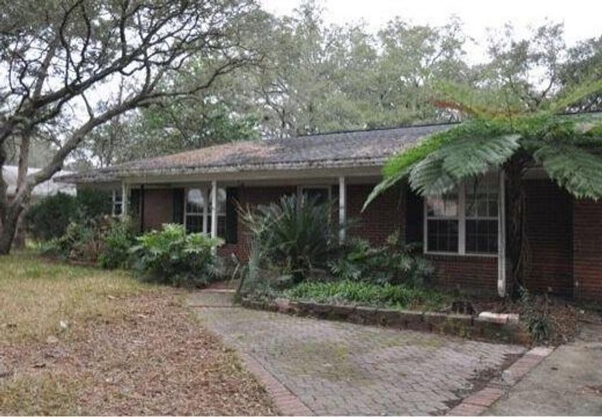 Bank owned. This home is in need of work, but does come complete with 1,996 square feet of living space and a converted garage, which can serve as either an office or additional bedroom. Exterior of the home has brick and vinyl siding, as well as vinyl trim. The location is great as it is located in the heart of Fort Walton Beach and close to shopping, schools, military bases, and beaches.