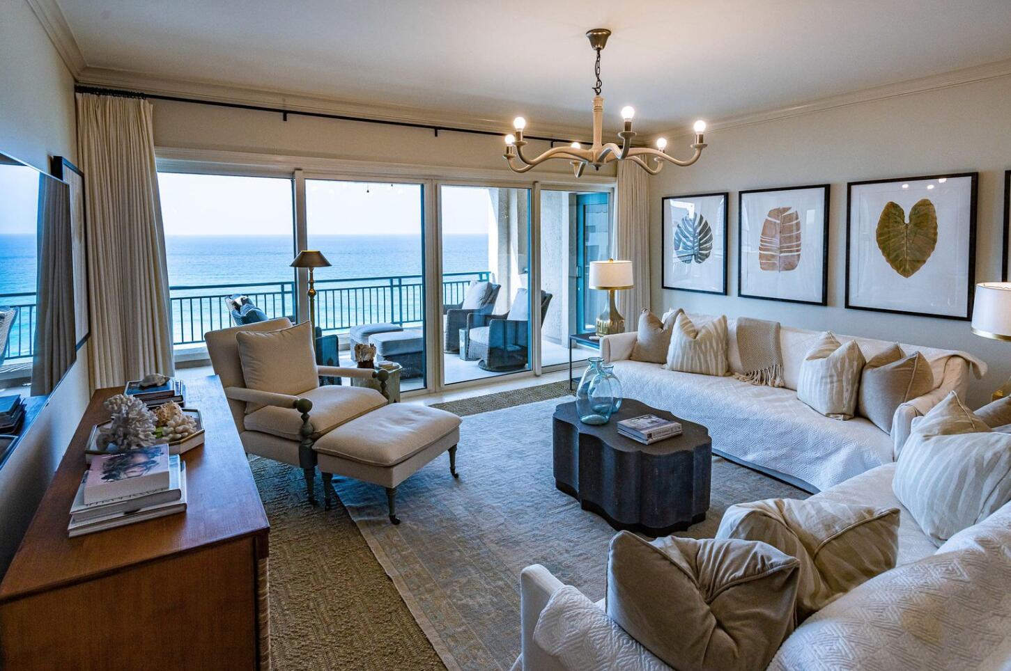 Live the ideal beach life in this incredible 12th story luxury Gulf-front condominium located in Sandestin Golf & Beach Resort. The interiors were fully renovated by Erika Powell of Urban Grace Interiors and features custom lighting and high-end finishes throughout. The open-concept kitchen, living, and dining room layout are filled with natural light and provide an inviting space for living and entertaining. Step onto the spacious balcony overlooking the pool, beautiful beaches, and emerald green waters of the Gulf. The kitchen features marble counter-tops, custom built cabinets with plenty of cabinet space, designer backsplash and breakfast bar. This gourmet kitchen also features a farmhouse sink and stainless-steel appliances such as: Subzero refrigerator, Wolf cooktop/oven