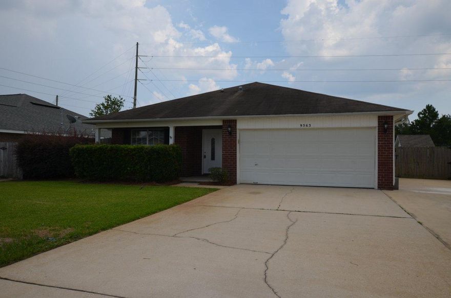 Move in Ready REO home with lots of space for the family! Located in the heart of Navarre and just minutes from the beaches, shopping, schools and bases, this 4 bedroom 2 bath home is just what the doctor ordered. Brick front with vinyl siding, the back yard is privacy fenced and the front has extra parking for boat, trailer or those jets skis. Home was recently rehabbed by the bank and comes with new granite tops in the kitchen, new stainless steel appliances, new laminate, carpet and fixtures throughout. A definite must see if looking for a larger affordable home in Navarre!