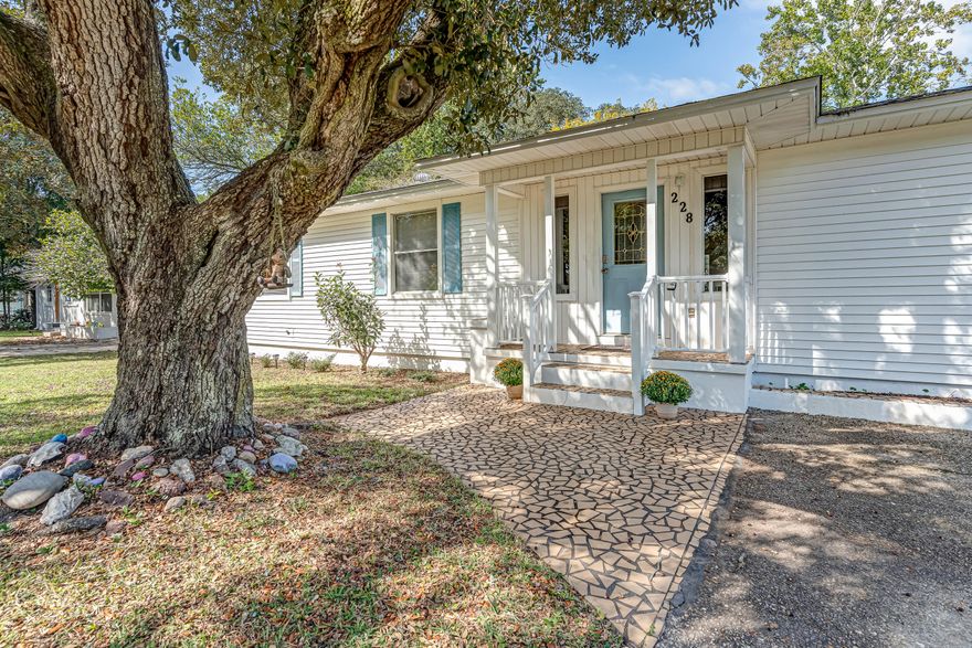 If you're searching for a home that offers charm, space, and flexibility--with no HOA--your search ends here!Located in the heart of Fort Walton Beach, this delightful property is just minutes from a scenic community park, boat launch, picnic area, popular restaurants, shopping centers, and beautiful beaches the area is known for. With few homes for sale and an array of amenities, the Garniers Beach neighborhood is one of Fort Walton's most desirable coastal communities.Inside this home, you'll be welcomed by abundant natural light, arched doorways, and separate dining and kitchen areas--both offering lovely views of the spacious backyard. The oversized laundry room provides plenty of space for storage, folding, and everyday functionality.  Out back, you'll find a large, fenced-in yard, perfect for gardening, entertaining, or simply relaxing in your own private retreat. A powered workshop offers endless potential for hobbies and DIY projects, and additional outdoor storage containers provide even more space to stay organized.

Additional features of this property include ceiling fans in all bedrooms, water heater replaced - 2025,  new mailbox, replaced sewer pipes in backyard, functioning sprinkler system, a keyless entry front door, an outdoor shower, an oversized hall closet for bonus storage, and utility hookups for your future outdoor kitchen.

This home is a blank canvas, just waiting for your personal touch. Whether you're looking for a peaceful retreat, a creative workspace, or your first home in a friendly coastal community where you can enjoy a glass of lemonade on the front porch, this hidden gem has it all.

Welcome Home!

Buyer is responsible for verifying ALL data and information, including lot size and room measurements, as it is deemed to be reliable but not guaranteed