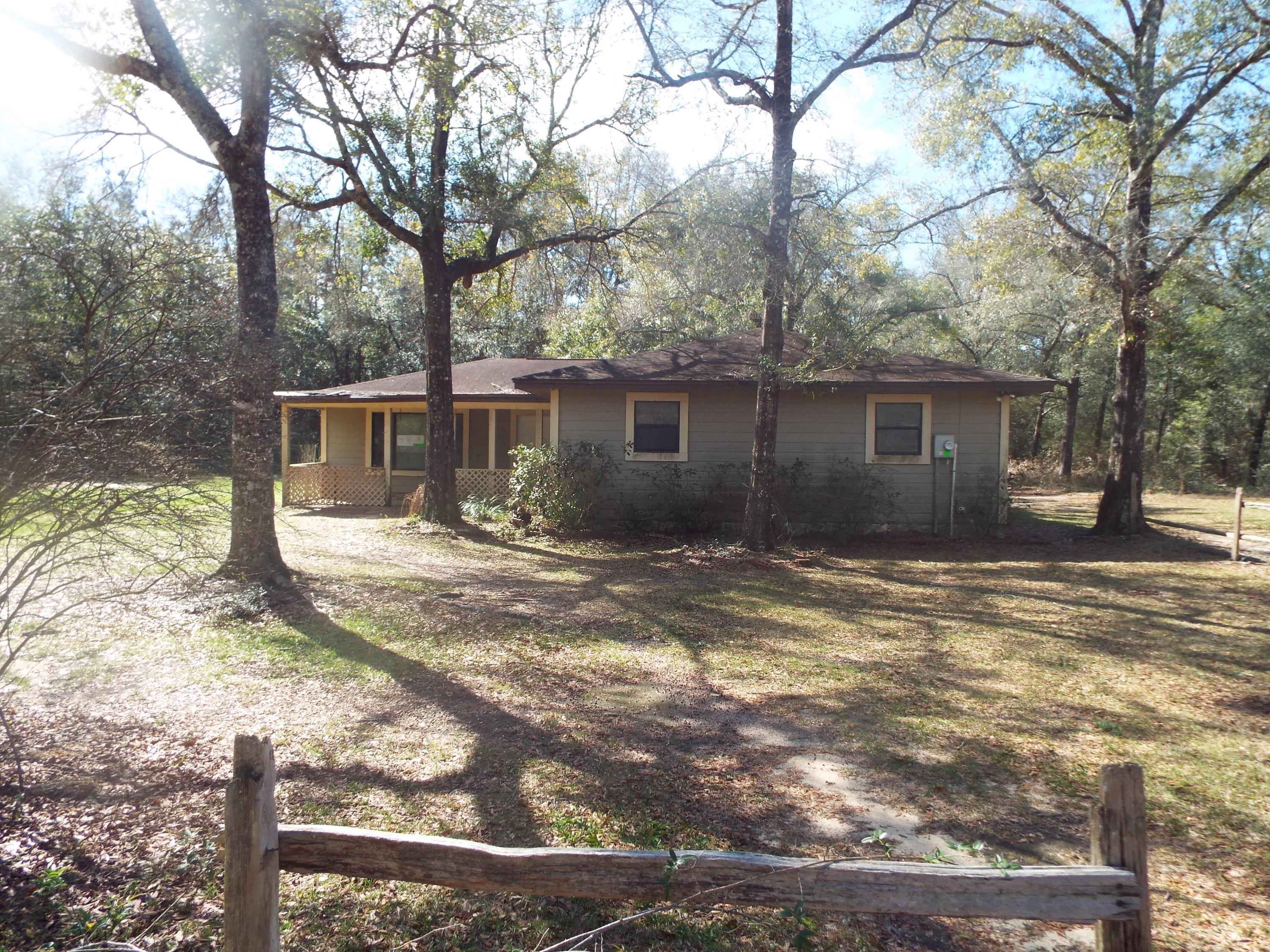 Cozy three bedroom rancher with a floor to ceiling stone fireplace, wood floors, big windows letting in lots of natural lighting, owner's suite has a spa like bathroom, deck and big yard. The lot is over five acres. Imagine the possibilities. Submit your best offer today. This property is bank owned. It is sold in as-is condition without repairs or warranty. Buyer is responsible for verifying all information contained in this listing.