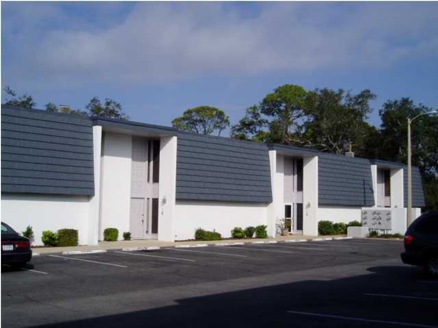 Stainless steel appliances! This lovely 2 story townhouse has cathedral ceilings in the living room area; separate dining room; very private back patio; located on the intercoastal waterway! Complex has an in-ground pool & 2 docks! What a fabulous way to relax. Sorry no pets allowed. Don't miss out!