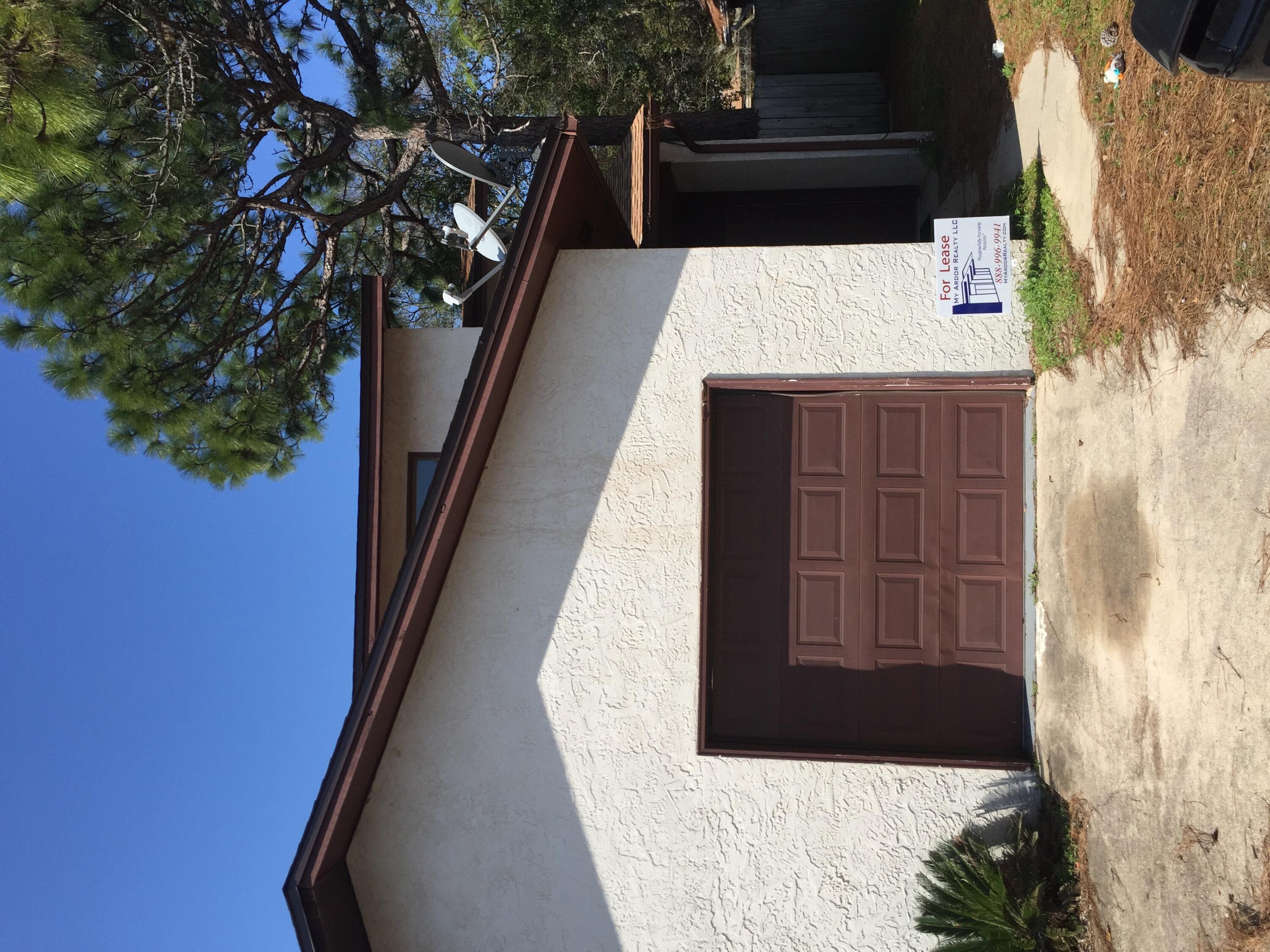 This end unit 2 bedroom 1.5 bathroom townhome is centrally located in Fort Walton Beach.  The home has laundry connections upstairs, privacy fenced yard, and a 1 car garage. Pictures show carpet downstairs, however, it will be replaced with new LVP flooring upon tenant vacating.  No pets