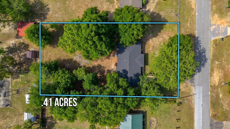 Immaculately maintained home! This affordable 3 bedroom with bonus space, 2 full bathroom home is ready for you with ALL the upgrades! Newly new (3 years or less) property boasts a roof, hot water heater, HVAC unit, all new flooring, tile shower, kitchen and bathroom cabinets, kitchen appliances, counters, light fixtures and more! From the moment you pull up, the outdoor space brings peace and tranquility with a spacious lot size (.41 of an acre!), mature trees, and is fully fenced in for your enjoyment. The interior does not disappoint with laminate flooring in main areas, ceiling fans throughout, and updated bathrooms and kitchen. The kitchen is a showstopper with quartz counters, stainless steel appliances, white cabinetry, tile backsplash, breakfast bar, and wood laminate flooring.