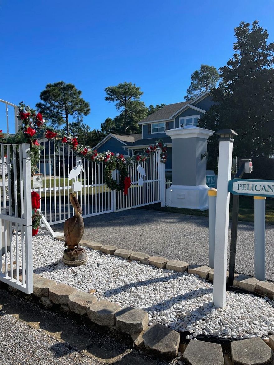 MOTIVATED SELLER! One of the last few great pieces of raw land available in this beautiful, gated, phase 2 section of Pelican Bay in Santa Rosa Beach.  Build your custom dream home on this quiet, semi-private, dead end court that is close to the bay, great shopping, restaurants and beaches.  Low HOA, community dock with parking and other amenities that include tennis and pickle ball courts make this this a great place to live! Close to golf courses and the beautiful Topsail Hill Preserve.  New home plans must be submitted to an architectural review board for approval. Flood Insurance may be required.
