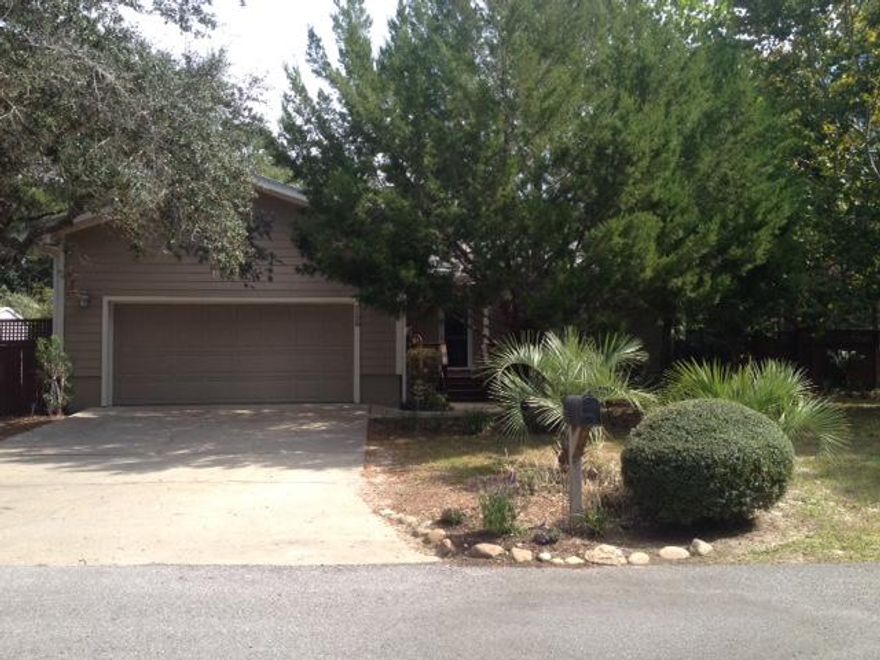 Great location and a big backyard! There is a wrap around porch and back patio with a lanai to enjoys Florida's amazing warm evenings. Crown molding throughout the home. Freshly painted. 3rd bedroom can be an office or bedroom. Great opportunity to live within a mile from the beaches of 30A.