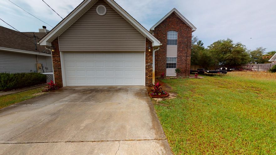 DON'T MISS OUT ON THIS HOME!! Hurlburt Field is approximately  3 1/2 miles away. Watch the beautiful sunsets over the sound from the upstairs balcony. The owners just installed granite in the kitchen and bathrooms. The large master bedroom suite on the first floor has french doors leading to a patio. Master bedroom offers a large walk-in closet, with extra storage. Large open great room with souring ceilings, tile floors and a corner fireplace. Entry way is tiled with a dramatic staircase leading to the two bedrooms upstairs. One upstairs bedroom has a balcony with beautiful views of the sunset over the Sound. Skylights give the upstairs bathroom a light and airy feel. Take a loo at the video tour and see how lovely this home flows.