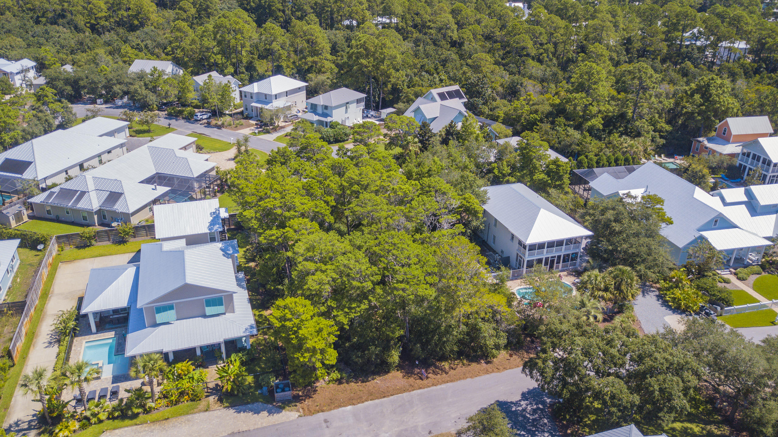 Under contract. Accepting back up offers. See new paths on proprty to view. 85' x 130' Seagrove Homesite - Private location right in the heart of Old Seagrove! Only locals know how beautiful and private this street truly is. Walk to the beach thru the dedicated pedestrian easement, enjoy biking the sandy lanes to Seaside for shopping, restaurants and events. Also convenient to Watercolor Crossings District 5 minutes away. No build out time or HOA with many possibilities to build your beach retreat - main house, guest cottage/garage and pool. Fantastic opportunity to secure one of the last remaining quarter acre homesites. *Buyer is responsible for personally verifying details about this property. Any information contained in this listing is believed to be accurate but is not guaranteed*