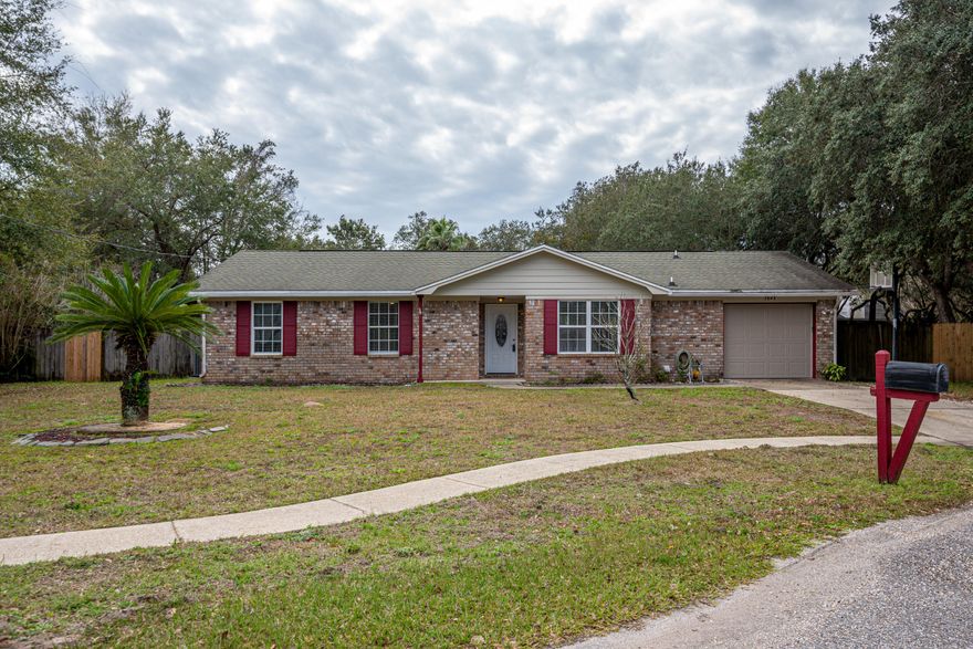 What a great find for only $220,000 in heat of Navarre! This adorable home was remodeled in 2019 to include new kitchen with granite countertops & stainless appliances, Newly remodeled bathrooms with new vanities & showers, tile throughout, paint, light fixtures, electrical and more. The home features a light and bright open floor plan with large living area, separate dining room and breakfast nook. The pantry is huge! 3 spacious bedrooms & 2 baths, both of which feature single vanities w/quartz countertops new hardware & lighting. The home is situated in a quiet cul de sac with a large back yard that is fully fenced and outside storage shed. New AC & Water Heater in 2019 and septic was just pumped in fall of 2019. This home is priced to sell and move in ready so call today!