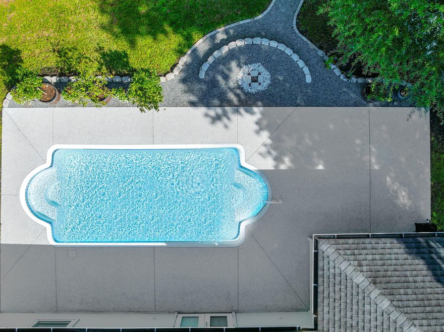 Welcome to this well-maintained 4-bedroom, 2-bath home tucked in a quiet cul-de-sac. Updates include brand-new windows for efficiency and style. Inside, the living room boasts vaulted ceilings and a cozy wood-burning fireplace, flowing seamlessly into the kitchen and dining area--perfect for everyday living and entertaining. Step outside to your private retreat with a sparkling pool, freshly coated patio, and gravel fire pit for evening relaxation. Fruit trees and a blueberry bush add charm to the backyard. Additional highlights include location in the sought-after Fleming Island High School district, no HOA or CDD fees, and a peaceful setting. This home is move-in ready and waiting for its next owner.