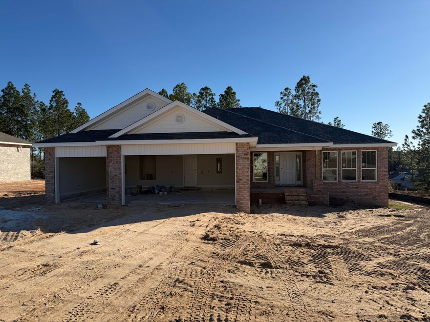 *$15K Your Way on this home which can be allocated towards Interest Rate Buy Down, Closing Costs and/or Prepaid Items (certain restrictions apply) * This Plan Features: 2 x 6 Exterior Construction, 3 CAR GARAGE, 4BR/3BA & Morning Rm, Flex Rm, Dining & Breakfast Cafe * 10 Ft Ceilings & Laminate Wood Plank Flooring in Main Living Areas * Granite Countertops Kitchen & Baths * Tile Flooring in all Baths* Kitchen: Granite Island, Stainless Steel Appliances & Walk In Pantry * Soft Close Cabinetry * Main Suite w/ Trey Ceiling & Main Bath with Builders Signature Zero Entry Walk in Tile shower w/ 2 Shower Heads, Separate Soaking Tub, Double Vanities & Large Walk-in Closets * Ceiling Fans All Bedrooms, Family Rm & Rear Covered Lanai * Irrigation & more.