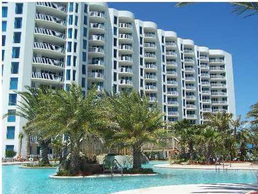 East building and facing the pool - furnished condo at The Palms of Destin! One full bedroom, one bunk room and two full baths. Kitchen features granite countertops and maple cabinetry. THIS UNIT SOLD FOR JUST OVER $345,000 IN 2007! Amenities at The Palms are first class. They include an expansive 11,000 SF lagoon pool with waterfall and spa, children's pool, playground and splash pool, lighted tennis and basketball courts, first class fitness center, seasonal shuttle service to the beach, and covered protected parking. Also on site is Sago Restaurant, conference center, social space, and reception desk. In addition to the usual services, the association fees include all utilities for the condo: Electricity, satellite TV, internet connection and local phone service. Taxes $1352.62