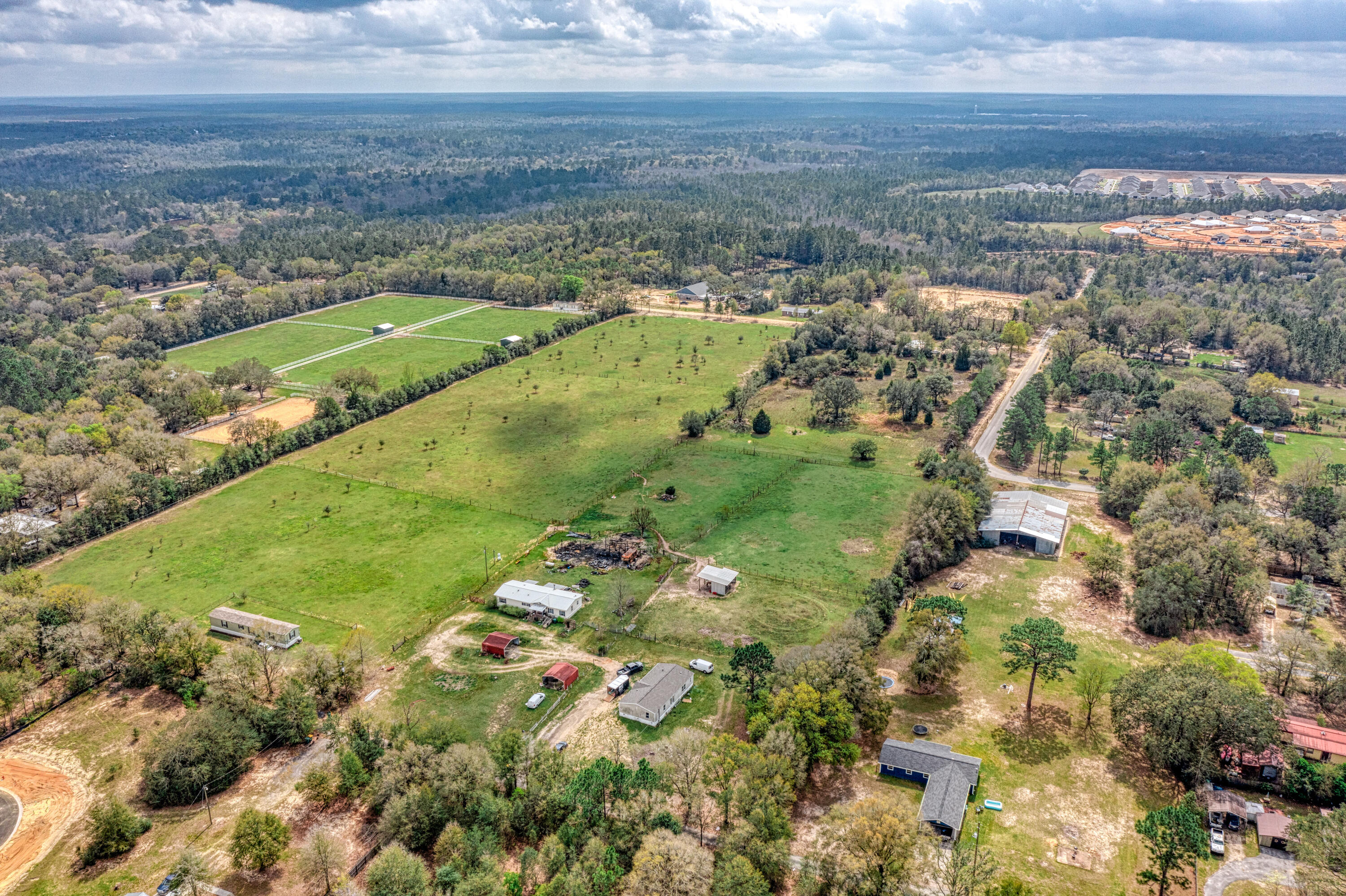 This will be a combination of three (3) separate parcels totaling approximately 21 acres +/- to be determined by a survey   Property can be seen from Earl Kennedy Road, or James Kennedy Road.   Property is fenced/cross fenced and is cleared and level~Parcel ID Numbers 22-3N-23-0000-0040-0000 and 22-3N-23-0000-0040-0010 and 22-3N-23-0000-0040-0020