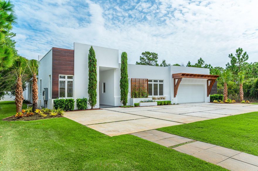 Amazing location with two properties for the price of one! Just a short distance from the beach, this beautiful three bedroom, three bath home is a unique find! It comes with a Vacant Lot! You can keep it as it is for added privacy or build as you wish for future investment! The Beach access is directly at the end of the street or enjoy your private pool! The courtyard architecture allows views from most rooms, for a serene atmosphere full of natural light. This home is nestled within a lush yard, mature palm trees and a beautiful white privacy fence surrounding the home giving you multiple spaces to relax and enjoy the outdoors! This can be your primary residence, short term rental, business office or all of the above!