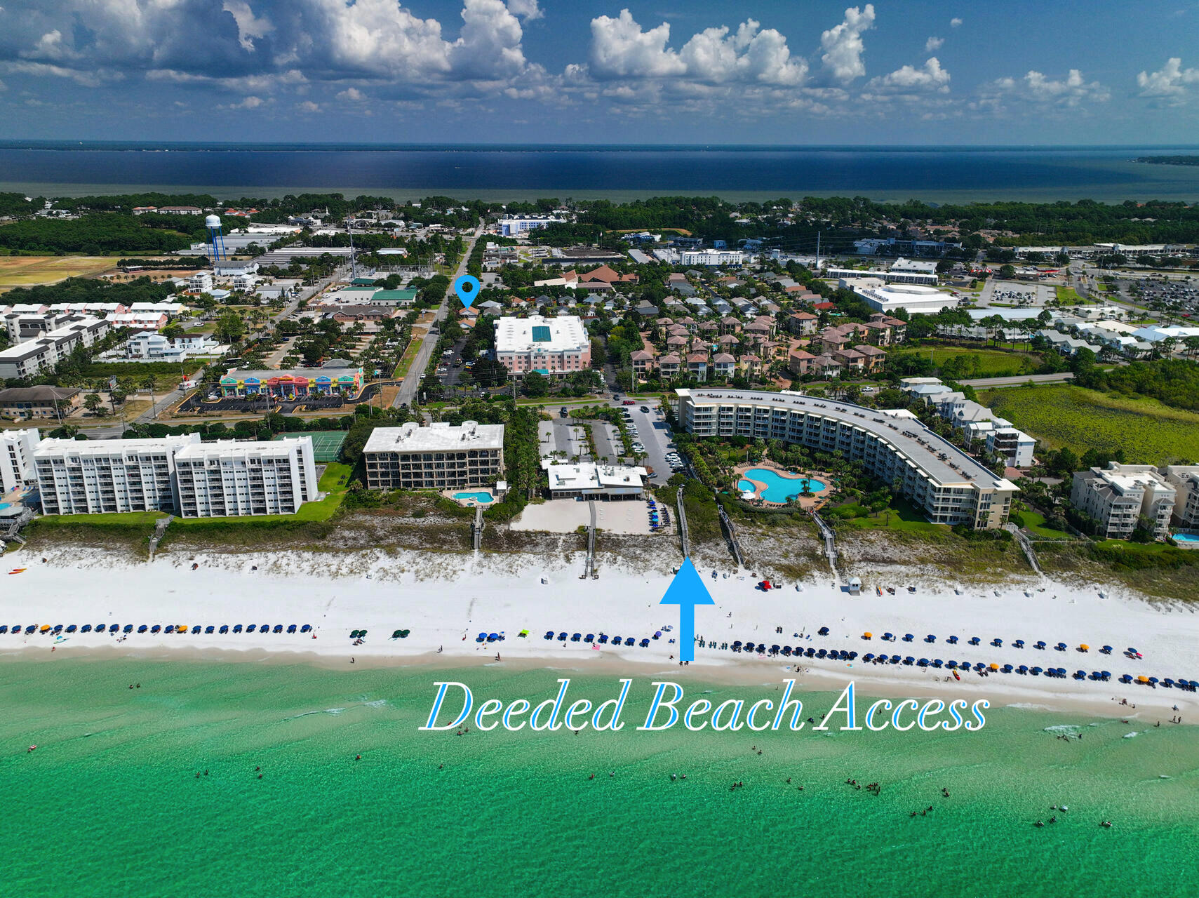 A must see in the sought after Miramar Beach neighborhood of Seaspray! Just one block from the beach and includes deeded beach access with parking. This beautiful 3 bedroom 2 bath brick previous model home with sunroom and covered front and back porches is a must see and has room for a POOL! Short term rentals allowed! One owner! Lots of updates including beautiful quartz countertops in the kitchen with tile backsplash & double oven, smart home light switches, updated master bath with tile shower, beautiful hand crafted barn door in living room, corrugated aluminum hurricane shutters, added insulation above garage, sprinkler system with wifi control and 4 year old roof with hurricane membrane! Seaspray features a community pool, deeded beach access and underground utilities.