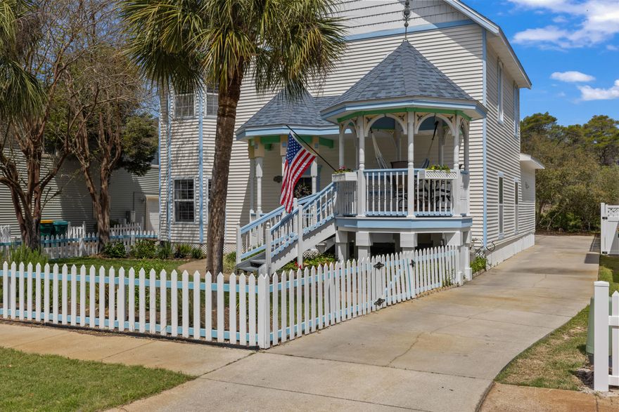 Welcome to this unique Florida Victorian style cottage, a treasure within the sought-after coastal enclave known as Sovereign Isle. This beautiful home offers an unparalleled blend of comfort and sophistication.  Just 3 Blocks from the Beach! Discover this beautifully updated, two-story home in the charming Sovereign Isle neighborhood of Destin, FL. With 4 bedrooms, 2.5 bathrooms, and a versatile bonus loft space, this home offers the perfect blend of comfort and coastal living. Step inside to an open-concept layout featuring  double height raised ceilings in the living room, huge windows that flood the space with natural light, along with the most elegant ornate railing upstairs overlooking from the loft into the living area.