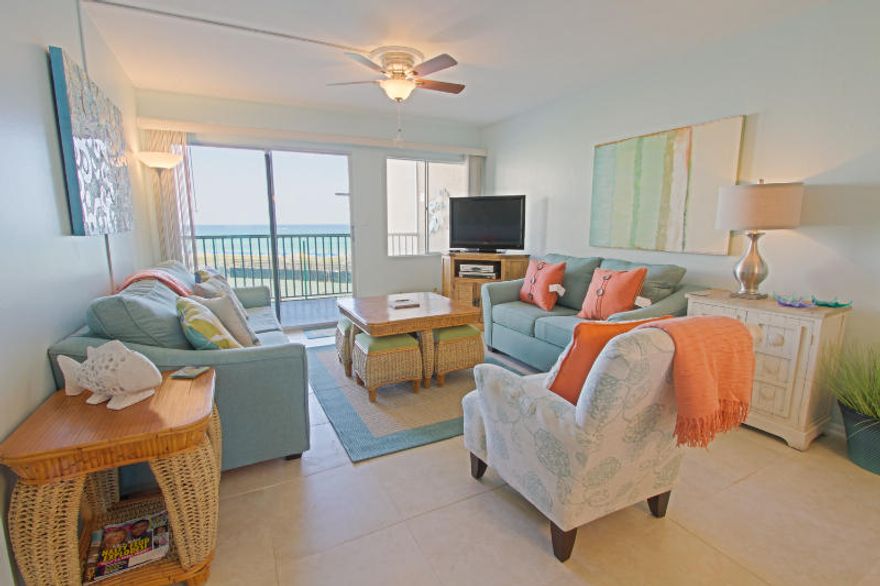 Newly remodeled (May 2016) two bedroom, two bath gulf front unit. This turn key condo comes equipped with all brand new furnishings by interior designer, granite countertops and tile throughout. Holiday Surf & Racquet Club provides a heated pool, fitness center, shuffle board, private beach and newly renovated lobby. Gated community with 24 hour on-site staff. $22K in gross rentals over the last 11 months!