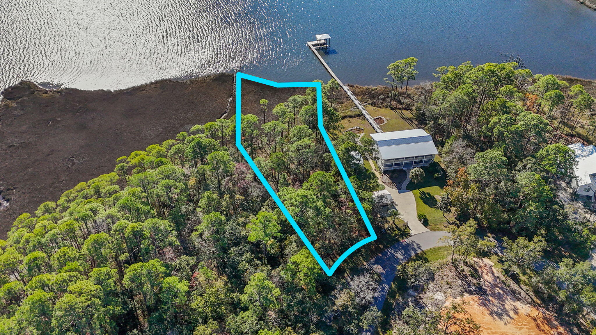 Prime Waterfront Lot on LaGrange Bayou Ready for Your Dream Home! This stunning 0.87-acre waterfront lot in Cross Creek Shores offers approximately 122 feet of beautiful shoreline along LaGrange Bayou. With direct access to Choctawhatchee Bay by boat and just minutes from the Freeport Regional Sports Complex, this property is ideally located for both tranquility and convenience. City water and sewer are available, and a previous site plan for a 1,500 sq. ft. home on piers was approved but will require renewal. Conservation easement and dock permits were completed in the past and will also need to be re-permitted. Buyers are encouraged to verify lot dimensions, survey details, and permitting requirements during their due diligence process. Don't miss this opportunity!!