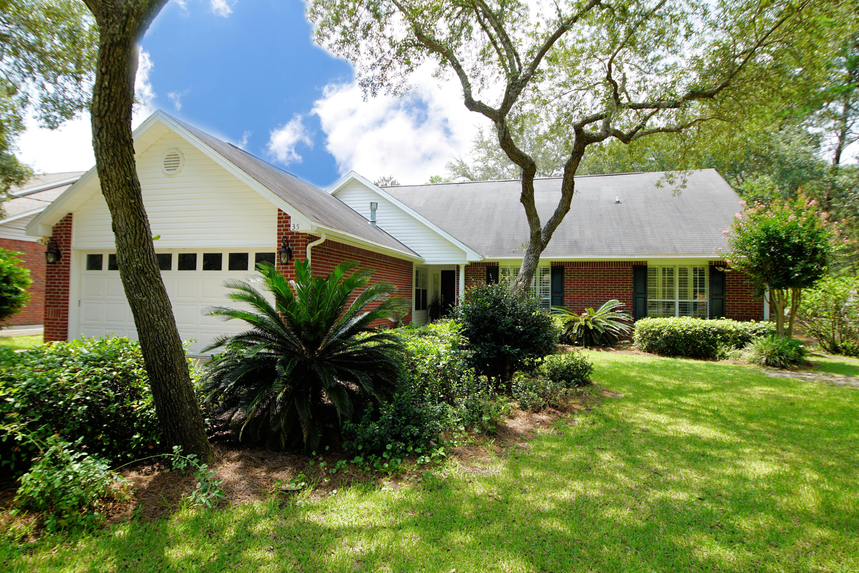 Back on market ready to sell! This stunning home is located in the highly desired Poquito Bayou Area. The traditional red brick 4 bedroom 3 full bath home is on a very large wooded lot that is simply ideal for your family. Within a half mile walk you are at the Poquito Bayou waterfront family park area. The large open floor plan is perfect for entertaining friends and family along with your large screened-in patio that overlooks the private back yard. The kitchen boasts plenty of cabinet space with granite counters and a gorgeous tile floor. On one end of the kitchen a breakfast nook area looks out over the backyard. Upon entering the home it opens up to a large family room, dining room and living room area with warm brown wood floors.