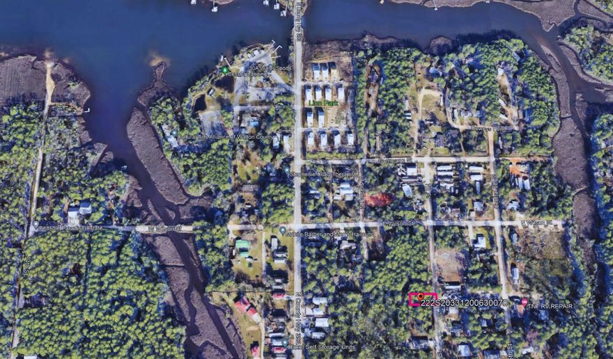 This is the BEST priced lot in the area with paved road access. Lots like this are rare! Located just 3.4 miles to Ed Walline Beach Access and the beautiful Gulf of Mexico. This lot is just minutes away from the beach, the bay, restaurants and shopping. Cesna Landing boat launch is only .5 miles away and the 393 boat ramp access on the bay is 1.9 miles away. Bring your boat and build a beach house get away. This lot is on a paved road with sewer and city water available. No HOA!