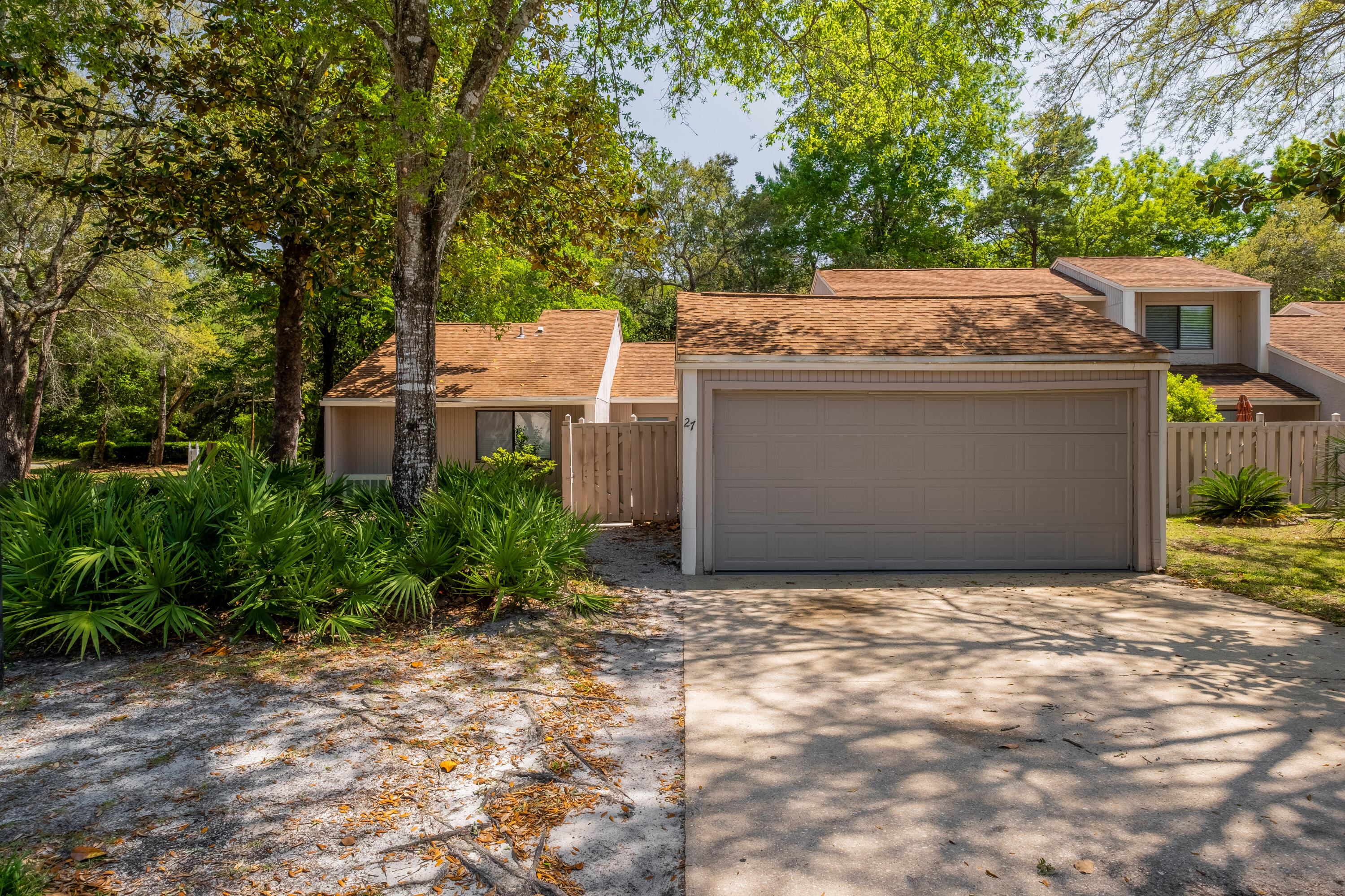 Welcome home! Fabulous move-in ready townhome for sale in the desirable Bluewater Bay area! This spectacular corner lot unit features a detached garage with opener, and a fenced in private court yard! Inside you will find a large living room with fireplace. Spacious kitchen with stainless steel appliances and tons of countertop space. Formal dining area with an additional breakfast bar. Breakfast nook. Office with beautiful french doors. Down the hall you will find a large guest bedroom with a spacious walk in closet. Full sized hallway bathroom. The oversized master bedroom features a huge vanity area, walk-in closet, and walk-in shower. Private additional patio area located off of the master. Fresh paint and new carpet throughout. The community offers additional parking and pool!
