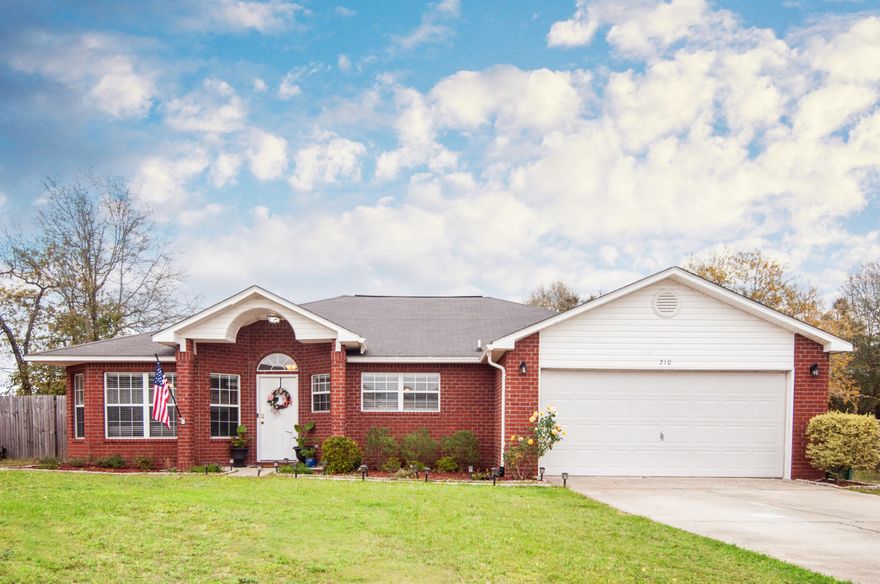 Contemporary 3 bedroom, 2 bath home located in central Crestview close to Duke Field and Eglin AFB. Riverside Elementary, Shoal River Middle School and Okaloosa Medical Center are all within walking distance. This home has a great split bedroom floorplan and over 1800 sq. ft. of living space. The expansive, tiled eat-in kitchen is light and bright, has an island and pantry, and is open to the living room with laminate flooring. The formal dining room has laminate flooring as well great for easy maintenance! The master suite is large; you'll love the double vanity and his and her closets in the master bath. French doors from the living room lead you to one of the largest backyards in the neighborhood, complete with an open patio and privacy fencing. Plenty of room for a pool here!
