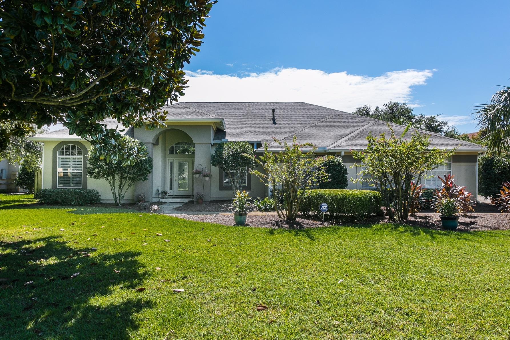 LOCATION is what you are looking for? Look no further than this gem in Plantation Hill! Conveniently located in the heart of Gulf Breeze proper. The natural lighting of moving walls opening into your beautiful screened in lanai and zen like pool and spa. There is a hop up bar accenting your stylish open kitchen with beautiful pendant lighting. This home offers wonderful spaces for entertaining family and friends. Walk to Gulf Breeze schools and Publix Shopping Center just minutes from the sandy white beaches of Florida's Emerald Coast. So come see this stunning home in Plantation Hill today!