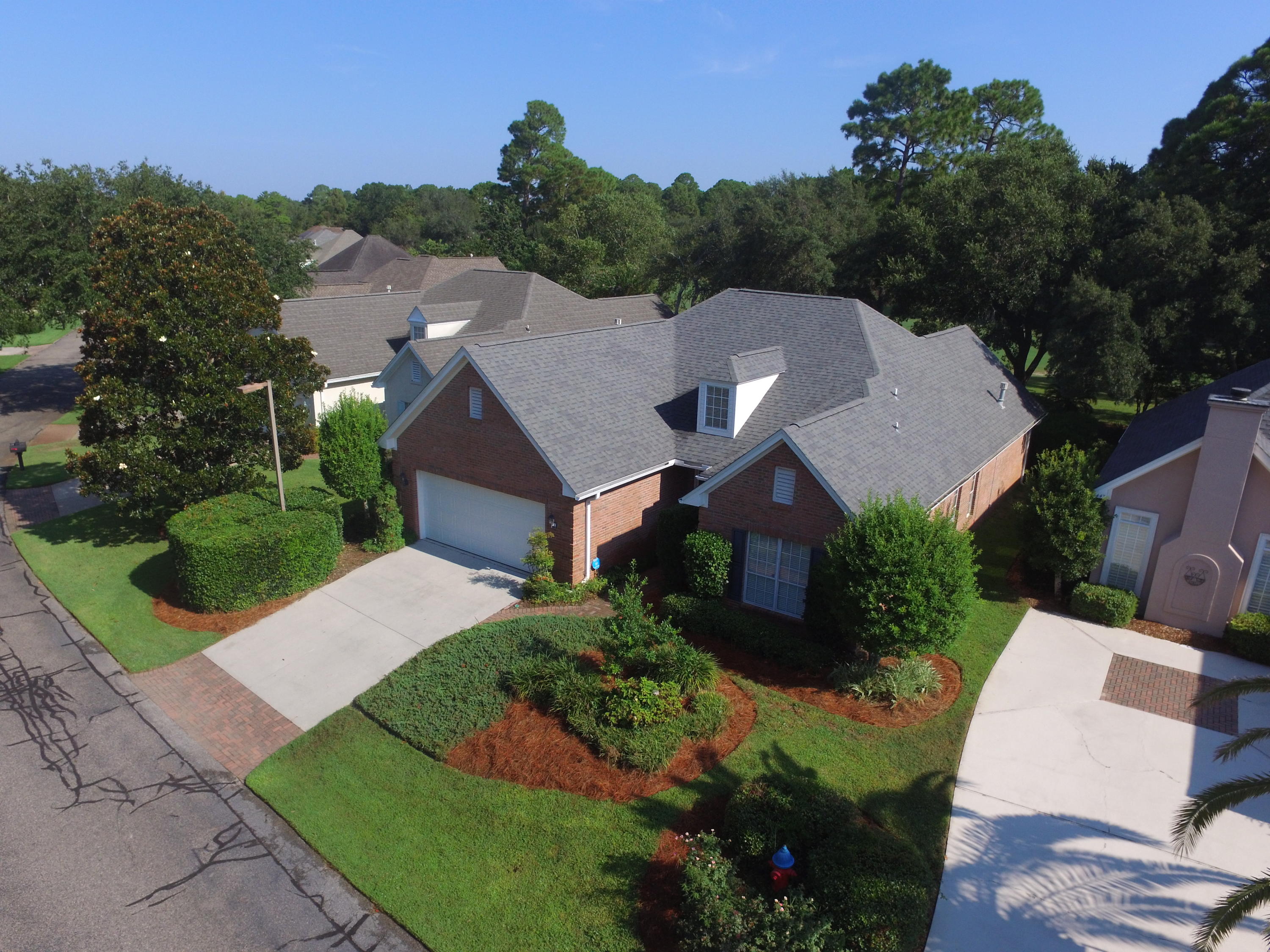 Pride of ownership is evident with this much sought after home in the Turnberry Place. This beautiful brick home sits on the 6th fairway.New roof (2012)New gas hot water heater(2014) New hvac(2008).Open split floor plan .This home is easy to maintain, with brick siding on zero lot line lot.,The kitchen is centrally located in the house ,great for entertaining friends and guests with custom cabinetry,granite counters,farm sink,stainless appliances.Large living room with built in shelving, gas fireplace and hand scrapped wood flooring.Dining area just off the kitchen.Family room opens to a open patio with natural gas grill.Master bedroom is large,Master bath features Garden tub/walkin shower ,large vanity,walk-in closet.central vac system ,security systemClose to Mid-bay bridge to D