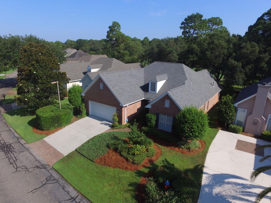 Pride of ownership is evident with this much sought after home in the Turnberry Place. This beautiful brick home sits on the 6th fairway.New roof (2012)New gas hot water heater(2014) New hvac(2008).Open split floor plan .This home is easy to maintain, with brick siding on zero lot line lot.,The kitchen is centrally located in the house ,great for entertaining friends and guests with custom cabinetry,granite counters,farm sink,stainless appliances.Large living room with built in shelving, gas fireplace and hand scrapped wood flooring.Dining area just off the kitchen.Family room opens to a open patio with natural gas grill.Master bedroom is large,Master bath features Garden tub/walkin shower ,large vanity,walk-in closet.central vac system ,security systemClose to Mid-bay bridge to D